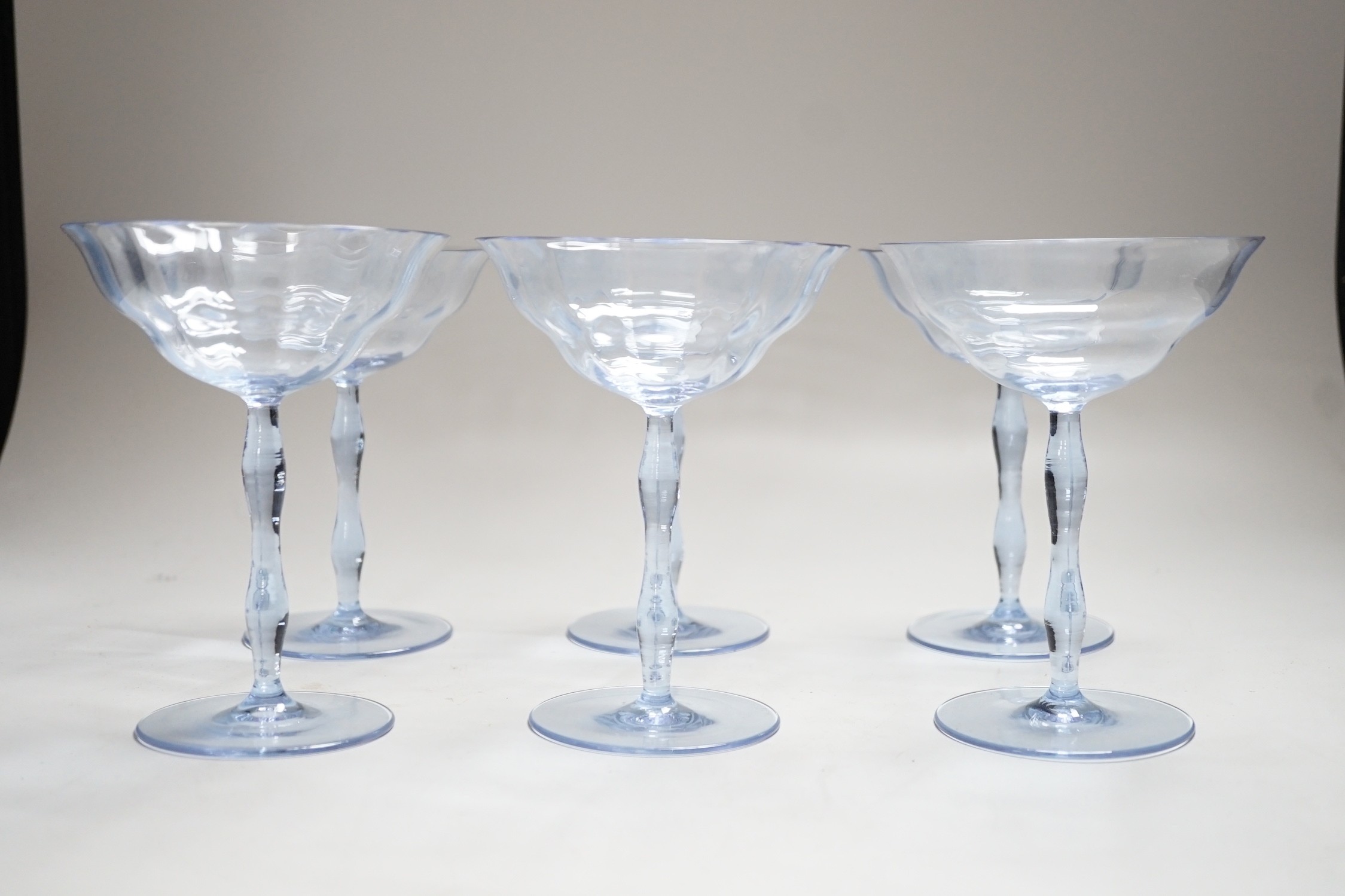 A set of six Art Deco lilac glass champagne bowls, Venetian style, reputedly made by James Powell & Sons. 15cms high